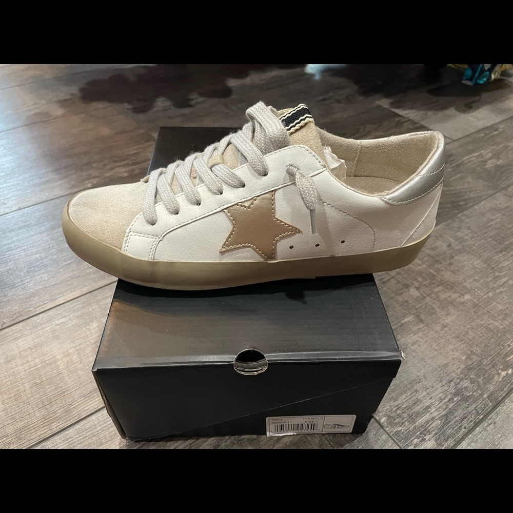 Shu shop Paris gold